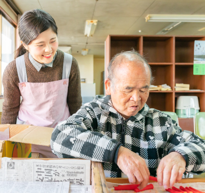 利用者と松井絵里さんの写真